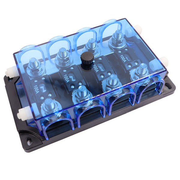 Top-down angled view of 4-way fuse block highlighting terminals and fastening knob
