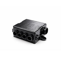 Black fuse holder with protective cover installed showing cable entry points
