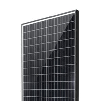 Angled close-up of solar panel surface showing tempered glass and frame