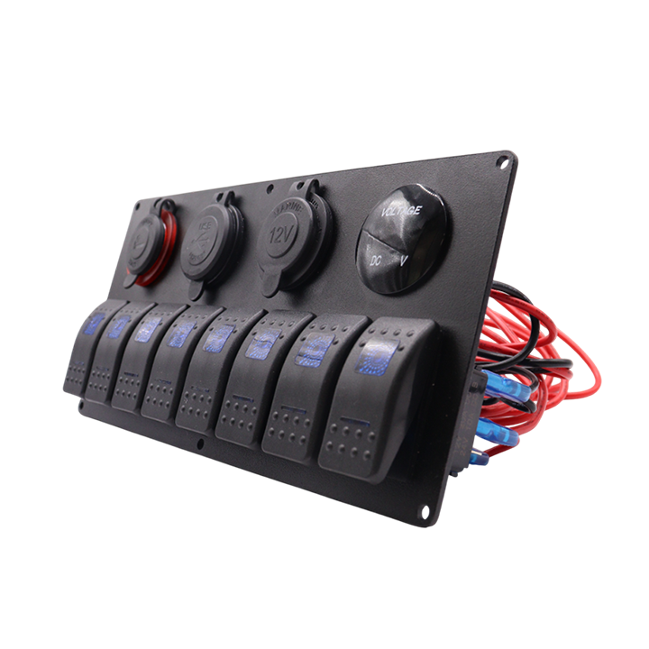 Angled view of black aluminium switch panel showing pre-wired harness and protective socket covers
