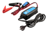 Angled view of Blue Smart battery charger with power cord and battery clamps