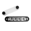 Overhead view of black busbar with five M6 studs and separate clear protective cover
