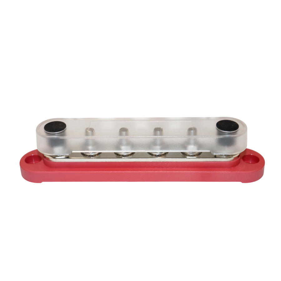 Angled view of red busbar with transparent safety cover installed over studs