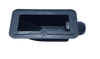Underside of black cable entry box revealing hollow cavity and internal locking nut