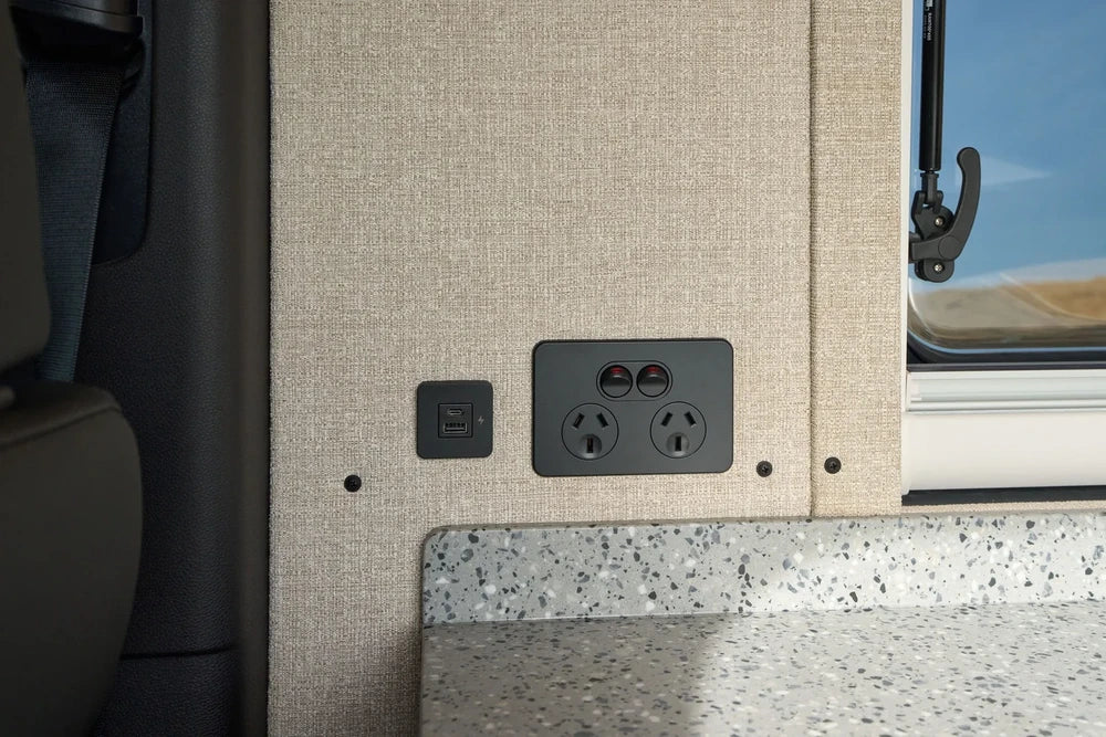 Scanstrut TILE USB socket installed next to a double power outlet in a caravan