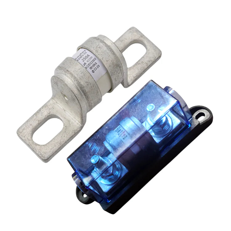 Exotronic 250A ceramic fuse next to a black fuse holder with a blue transparent cover and bolt terminals