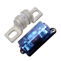 Exotronic 400A ceramic fuse next to a black fuse holder with a blue transparent cover and bolt terminals