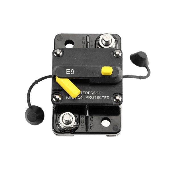 Circuit breaker top view showing AUX and LOAD connection markings on housing