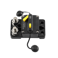 Close-up perspective of circuit breaker connection terminals and mounting holes