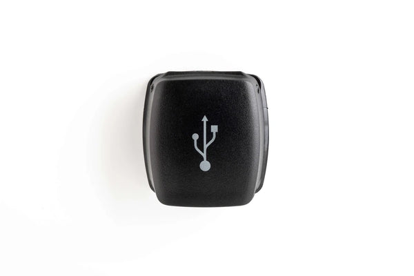 Front view of closed Flip Pro USB socket lid with white icon