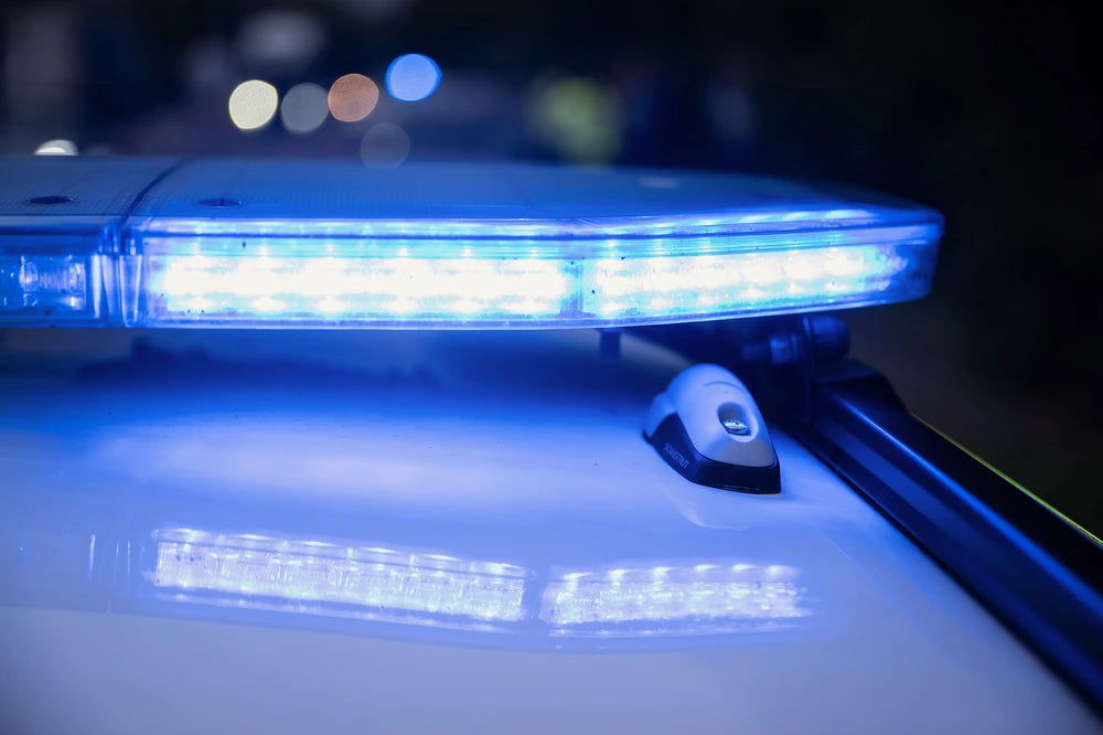 Product installed on a police car roof near an emergency light bar