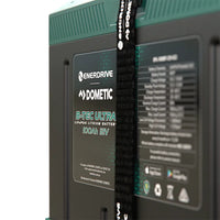 Close-up of the technical specification label and Enerdrive Dometic branding on the battery front