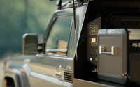 Side view of a vehicle canopy with the Enerdrive Voyager system installed inside