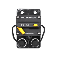 Top-down view of 60A waterproof circuit breaker featuring manual reset lever and terminal covers