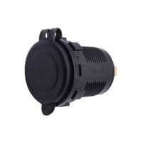 Black flush mount USB socket with protective rubber cover closed over the face