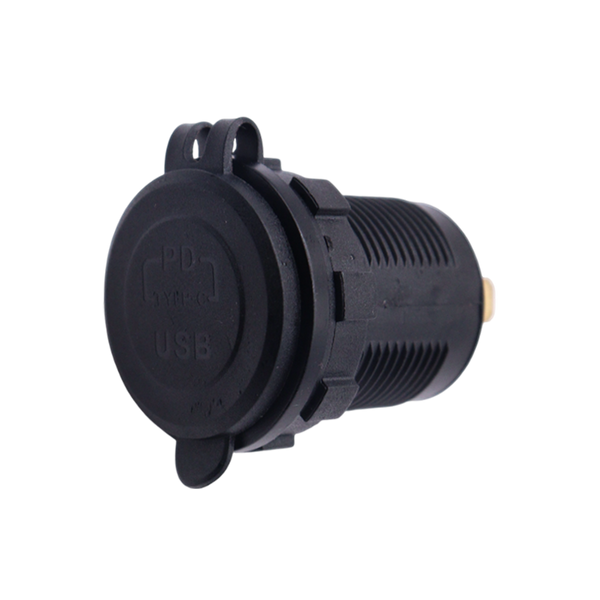 Black flush mount USB socket with protective rubber cover closed over the face