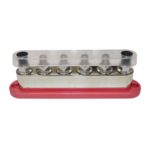 Front view of red busbar with clear cover installed showing voltage and amperage rating text