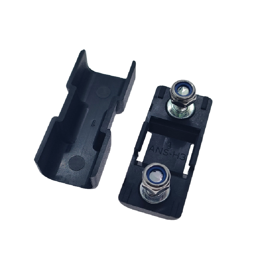 Open fuse holder showing internal cover ribs and base with ANS-H3 moulding and studs