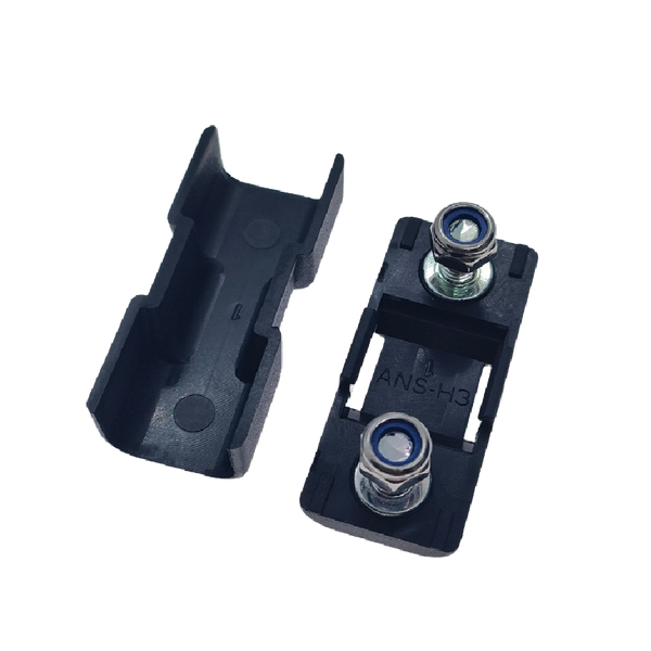 Open fuse holder showing internal cover ribs and base with ANS-H3 moulding and studs