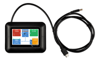 Top-down view of GX Touch 50 display in adapter bezel with USB cable