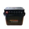Front view of black battery box with red master switch, digital voltage display, USB ports, and 12V sockets