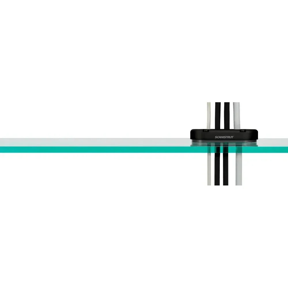 Close up of a multi cable seal installed on a clear panel with three cables