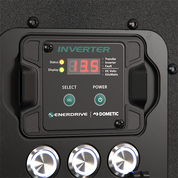 Detail of the 2000W inverter remote display and three illuminated accessory pushbutton switches