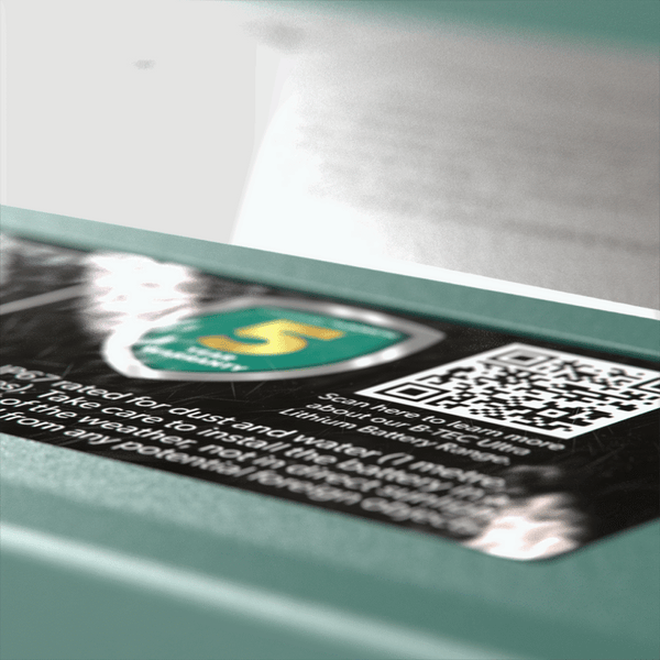 Close-up of the IP67 waterproof rating and 5-year warranty seal
