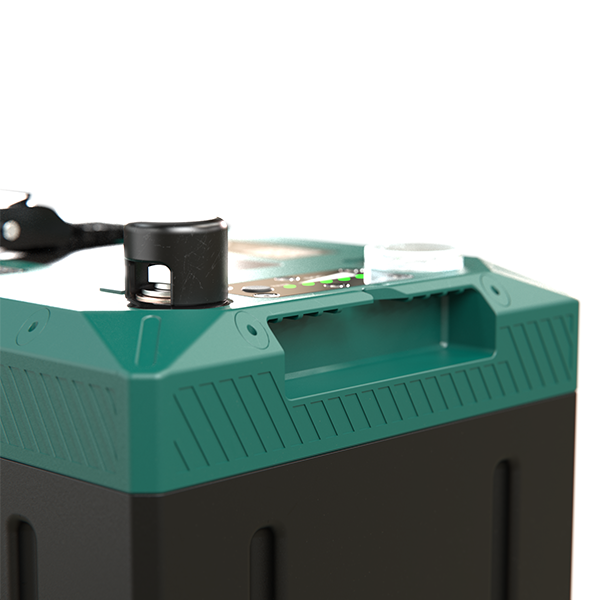 Detailed view of the integrated carry handle and LED state of charge indicator on the battery top