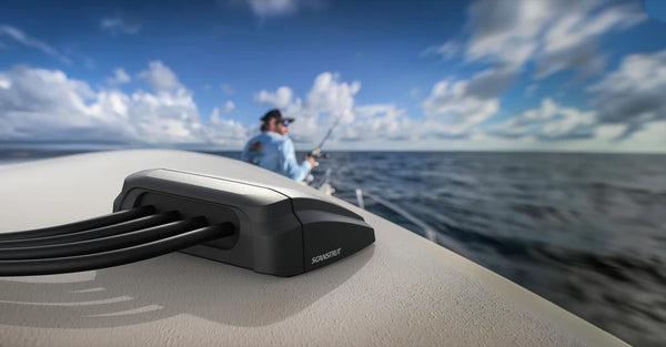 Scanstrut multi cable seal installed on a boat deck with fisherman in the background
