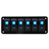 Front view of 6-gang marine rocker switch panel with blue LED indicators on black aluminium plate