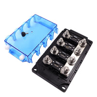 4-way mega fuse holder with cover removed showing M8 steel studs and fuse placement
