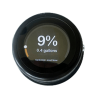Circular Mopeka LCD remote display unit showing 9% tank level and 0.4 gallons readout
