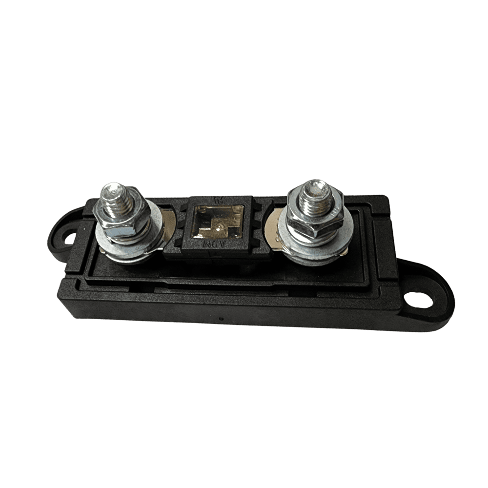 Open fuse holder base with cover removed showing an installed fuse on the terminals