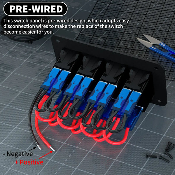 Rear view of pre-wired switch panel showing red positive and black negative cables with insulated connectors