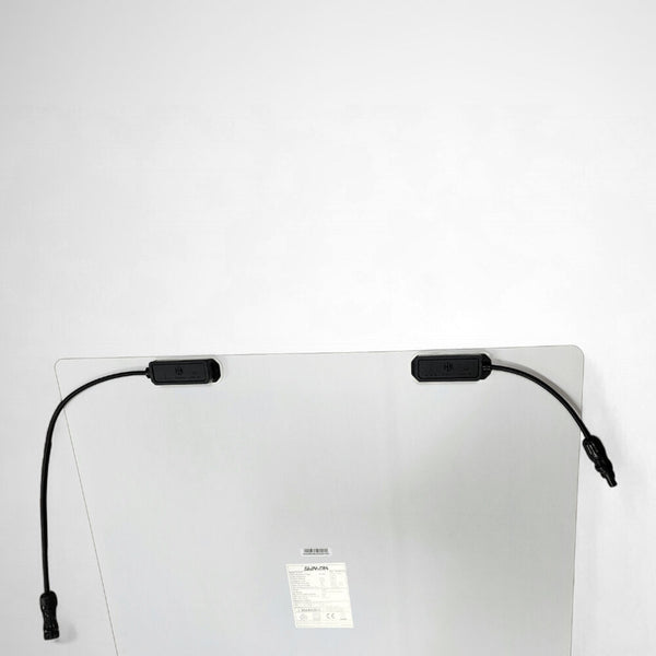 Underside of Sunman solar panel showing rear-mounted junction boxes and cables