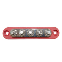 Top-down view of red busbar showing five tin-plated copper studs