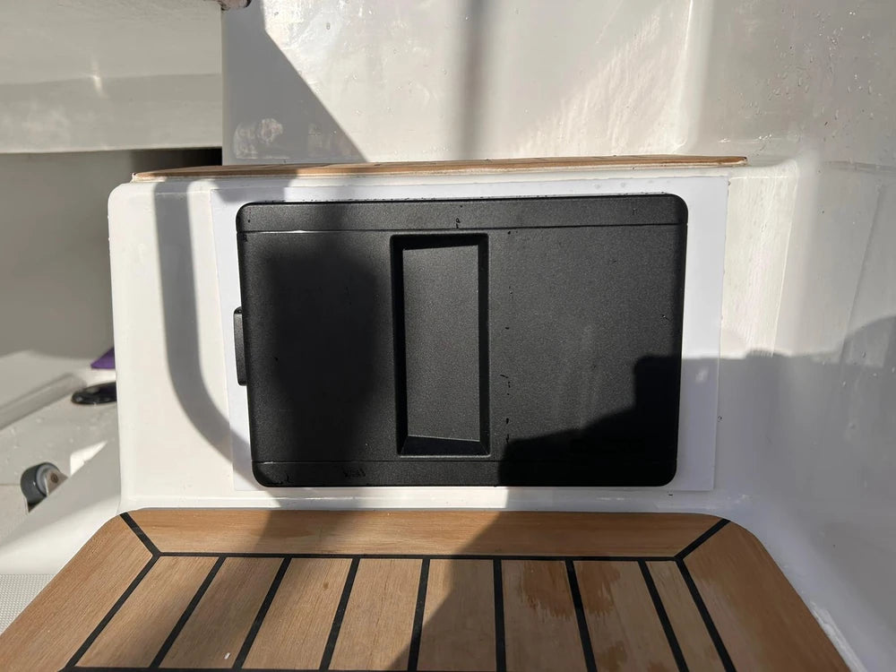 Installed Scanstrut ATMOS air pump station with the protective sun cover closed