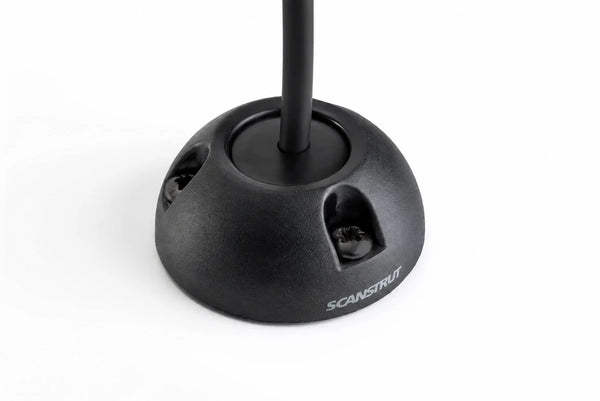 Black Scanstrut vertical cable seal installed with a cable on a white surface