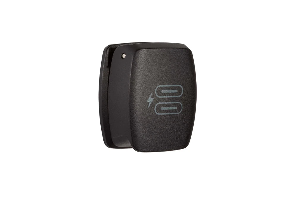 Angled perspective of the charge socket with the lid in the closed position