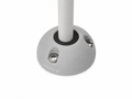 Grey vertical cable seal installed with white cable on a flat surface