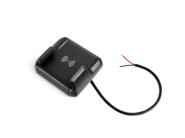 Angled view of Nano wireless charger showing integrated 12/24V power cable
