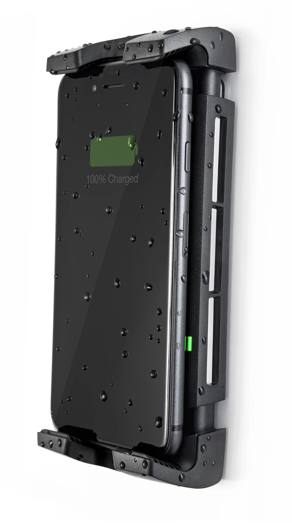 Profile view of a charging phone in a wall-mounted waterproof cradle