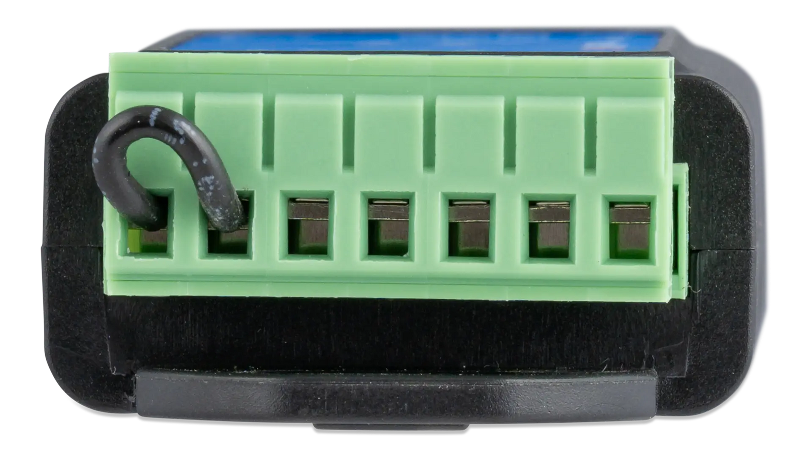 Close-up of the 7-way screw terminal block with a factory-installed remote loop wire