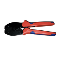 Exotronic solar connector crimping tool with red and blue ergonomic handles in closed position showing die slots