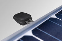 Double cable seal routing grey solar cables through a white vehicle roof