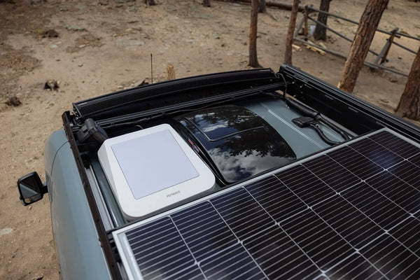 Overview of a van roof featuring solar panels and Scanstrut cable management