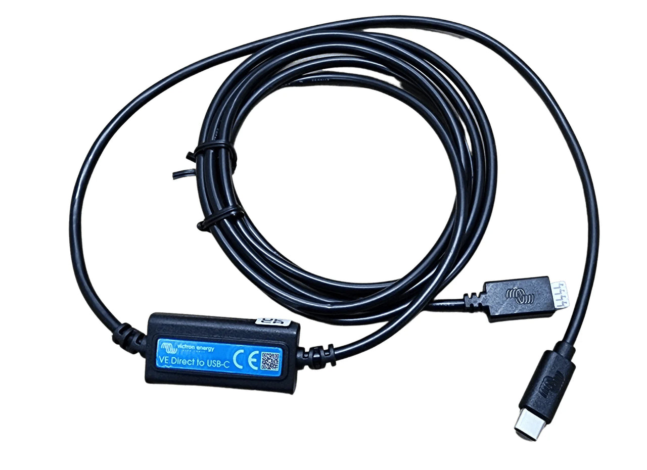 Coiled 1.8m black interface cable with an inline converter connecting a VE.Direct plug to a USB-C connector