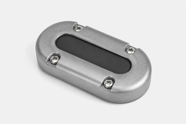 Empty aluminium vertical multi cable seal showing the internal rubber bung and mounting holes