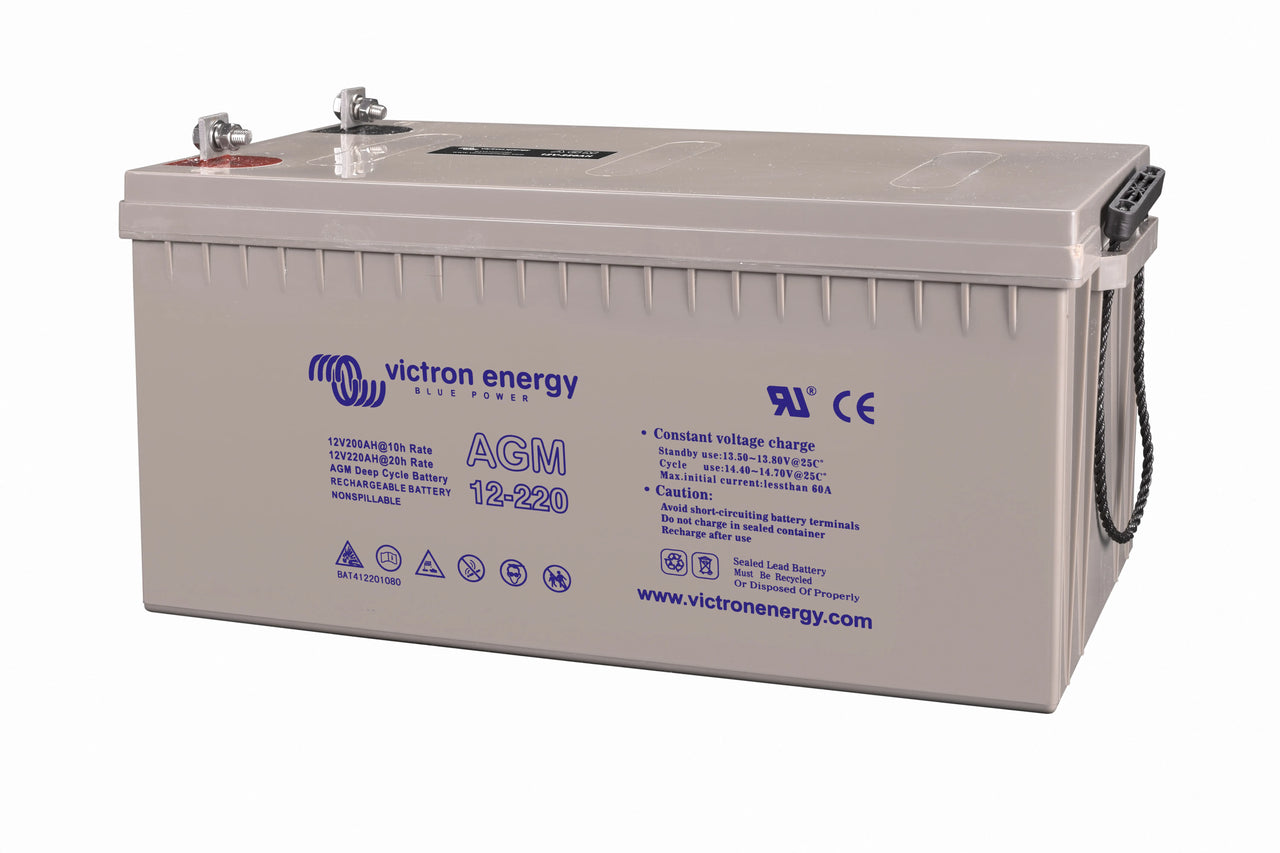 Angled view of Victron 12V 220Ah AGM battery with technical labels and M8 terminals